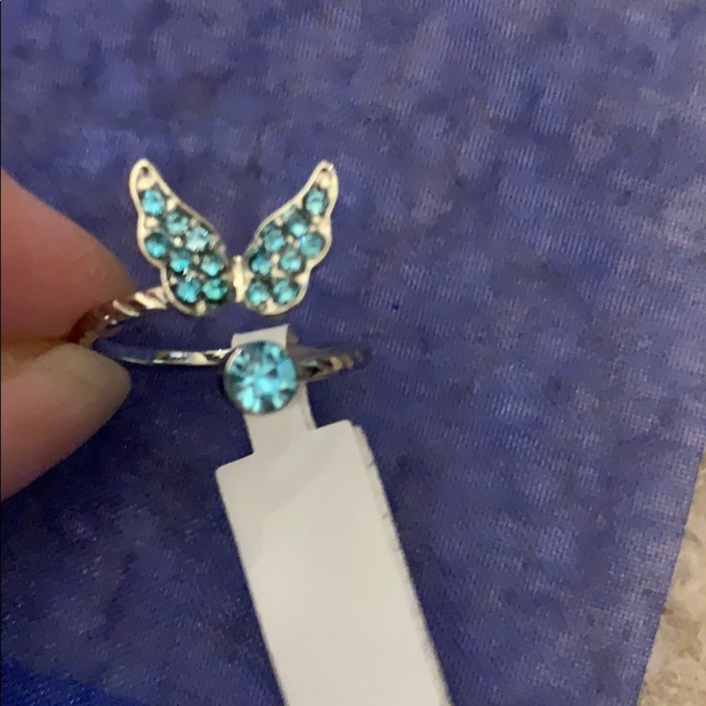 Butterfly ring.